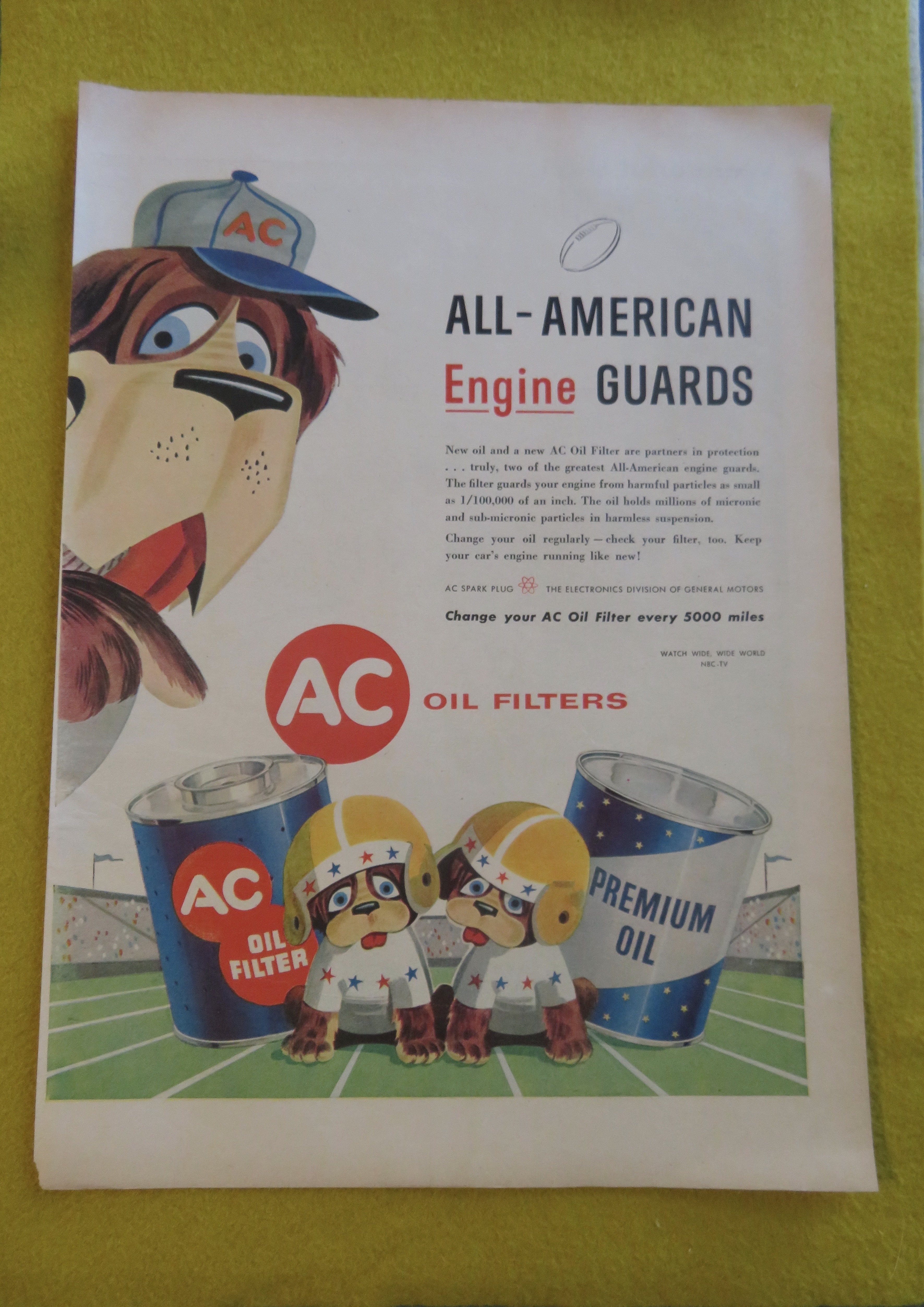 1956 AC Oil Filter with A Dad Dog & His Two Puppies