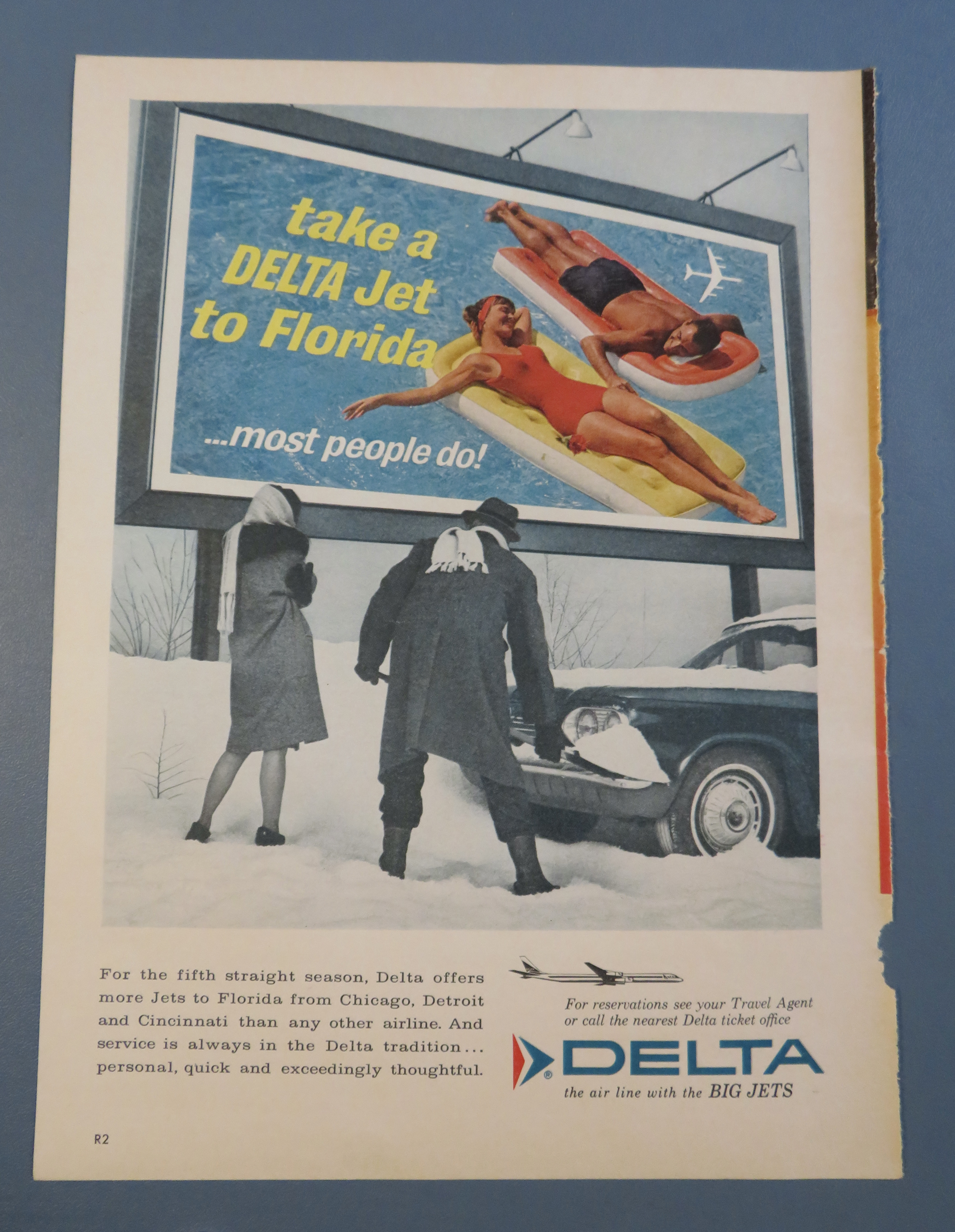 1963 Delta Air Lines with Man Shoveling Out His Car