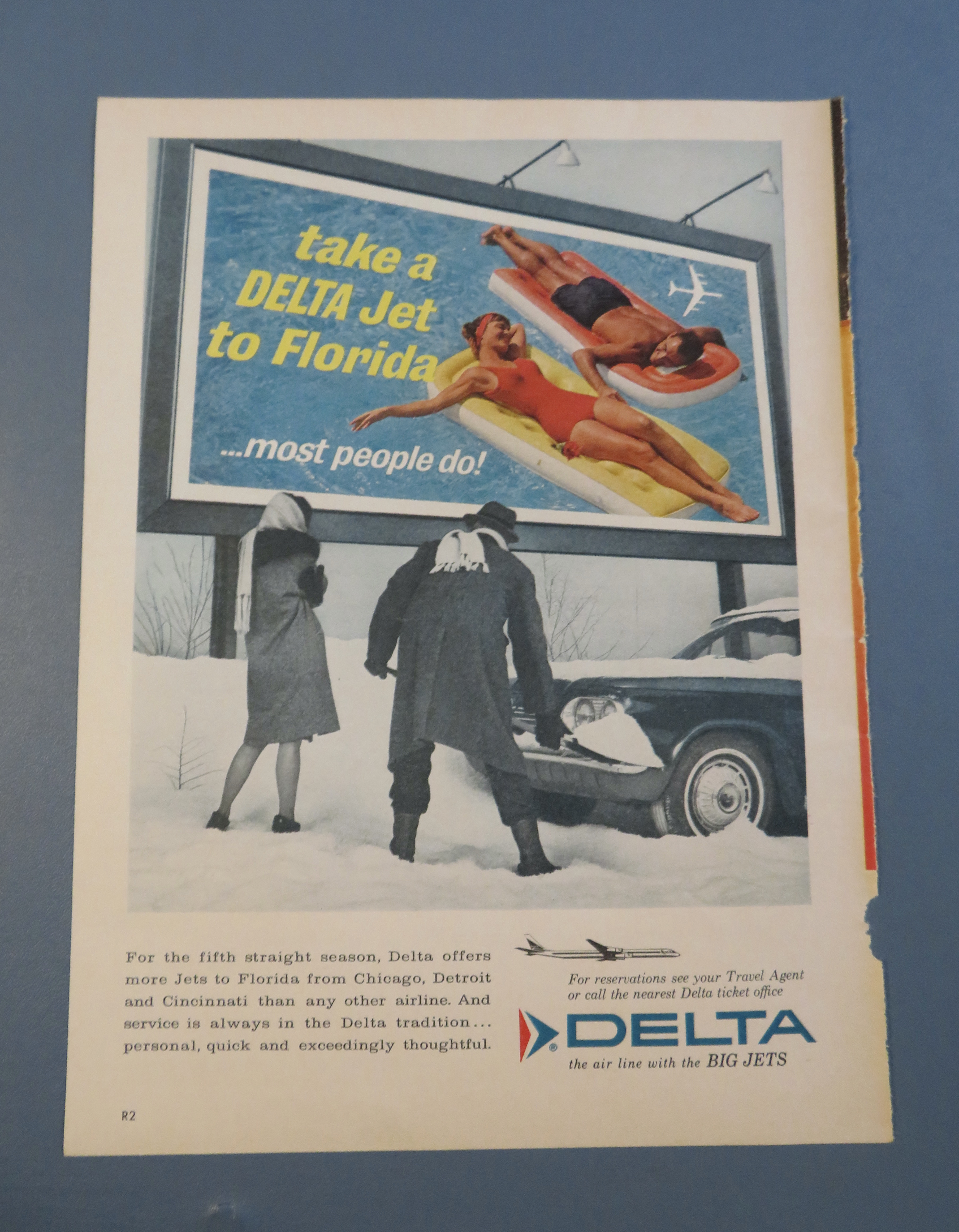 1963 Delta Air Lines with Man Shoveling Out His Car