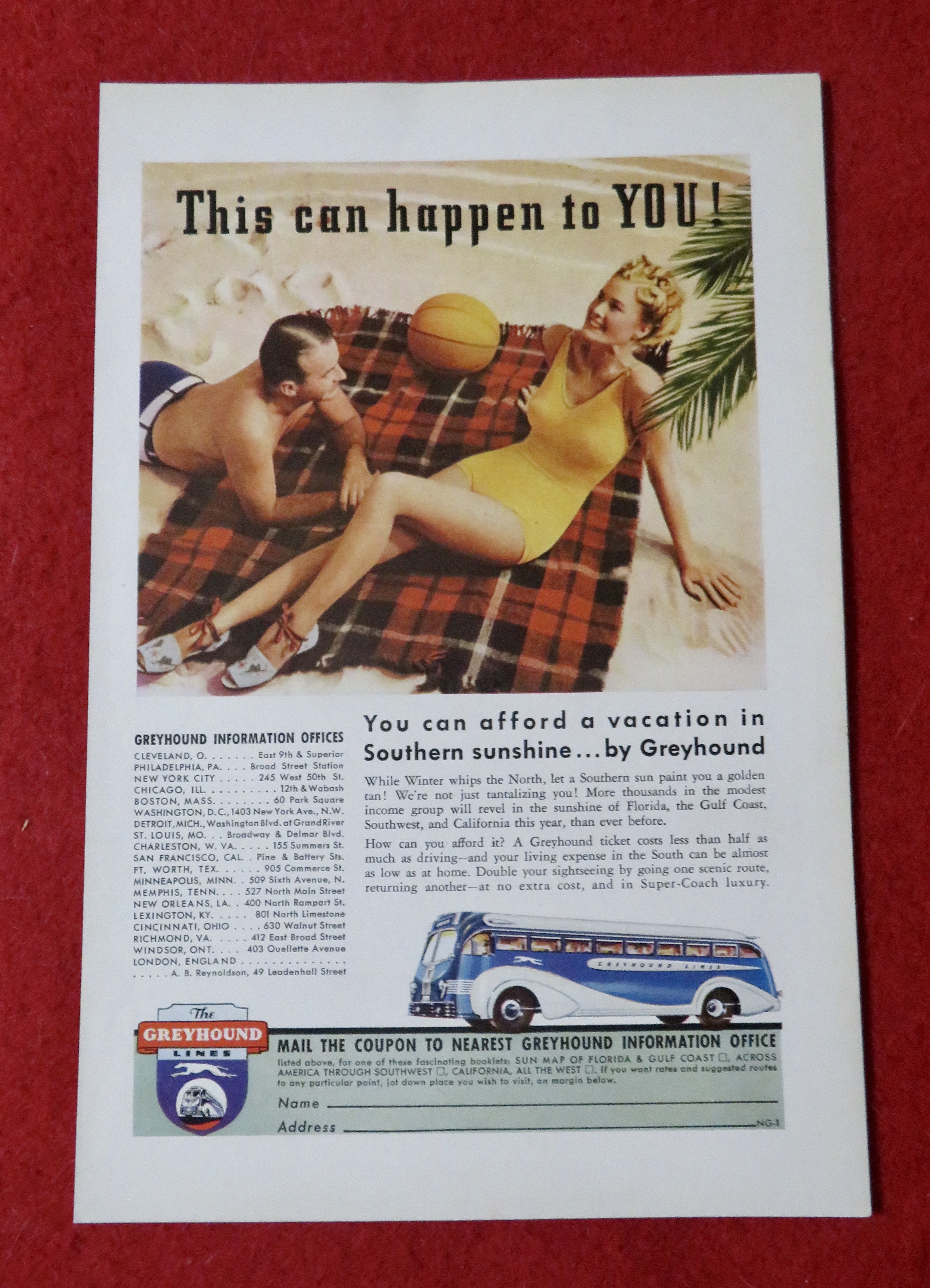 1939 Greyhound Lines with Couple Laying on the Beach