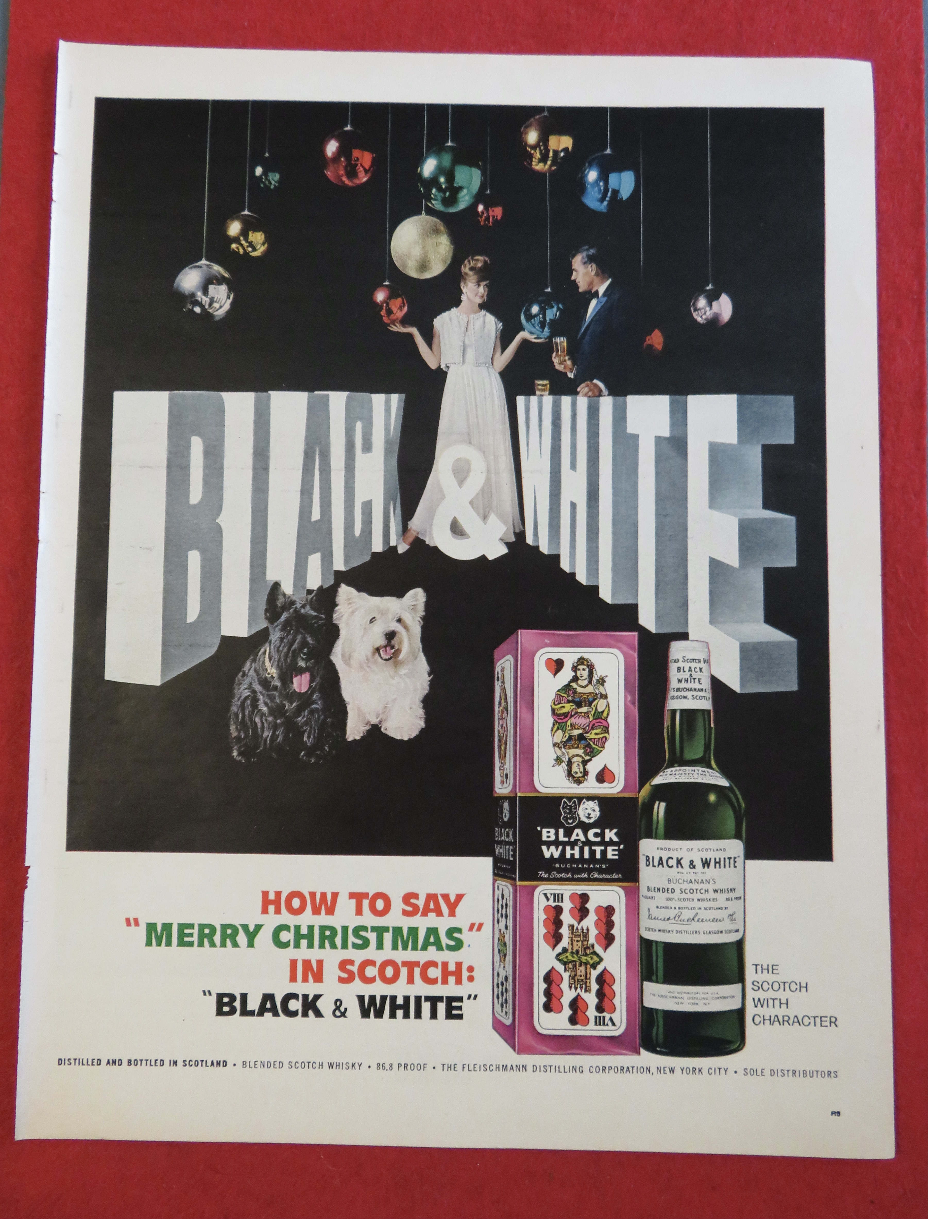 1963 Black & White Whiskey with Man & Woman & Terriers