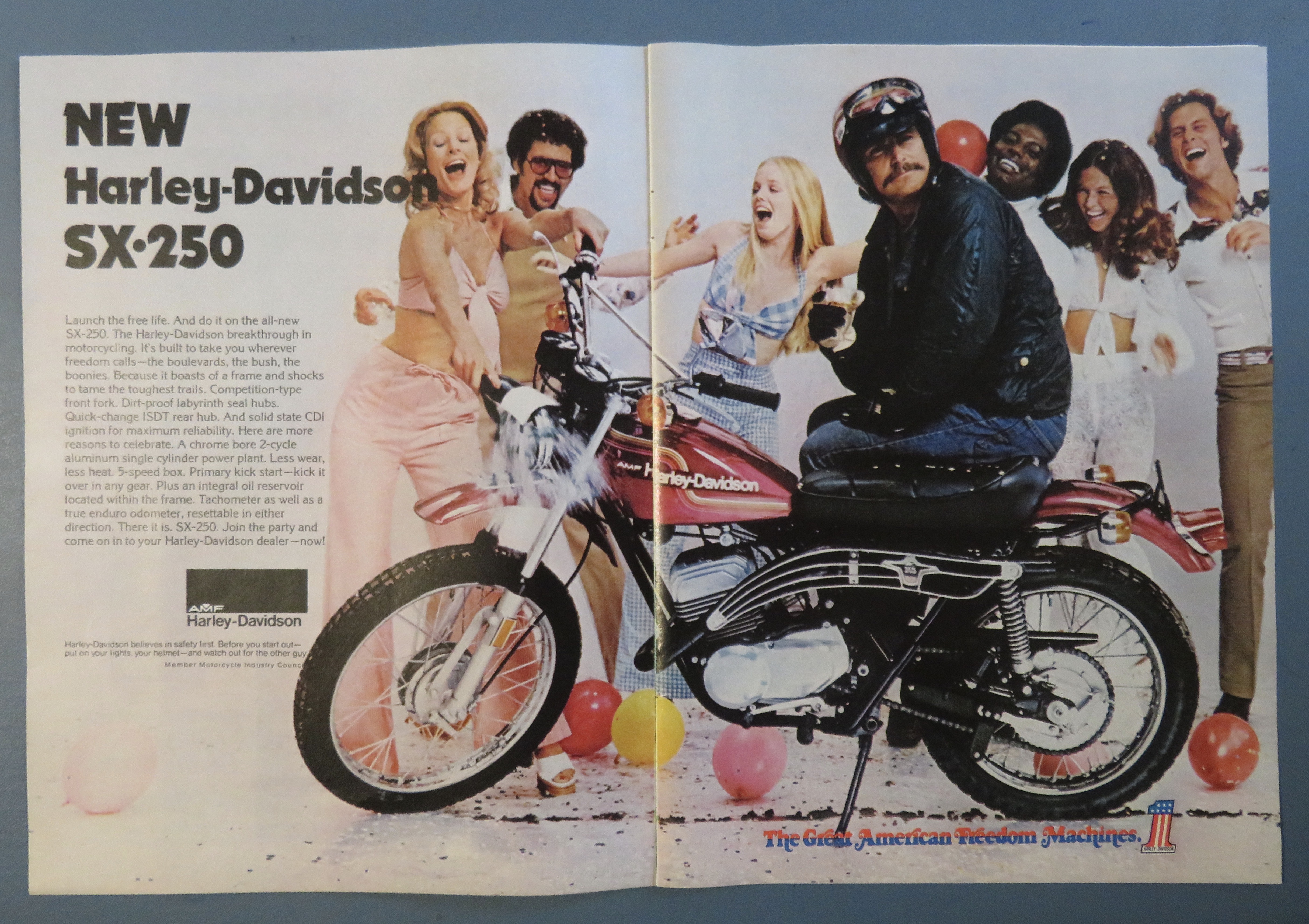 1974 Harley Davidson SX-250 Motorcycle with Man Sitting