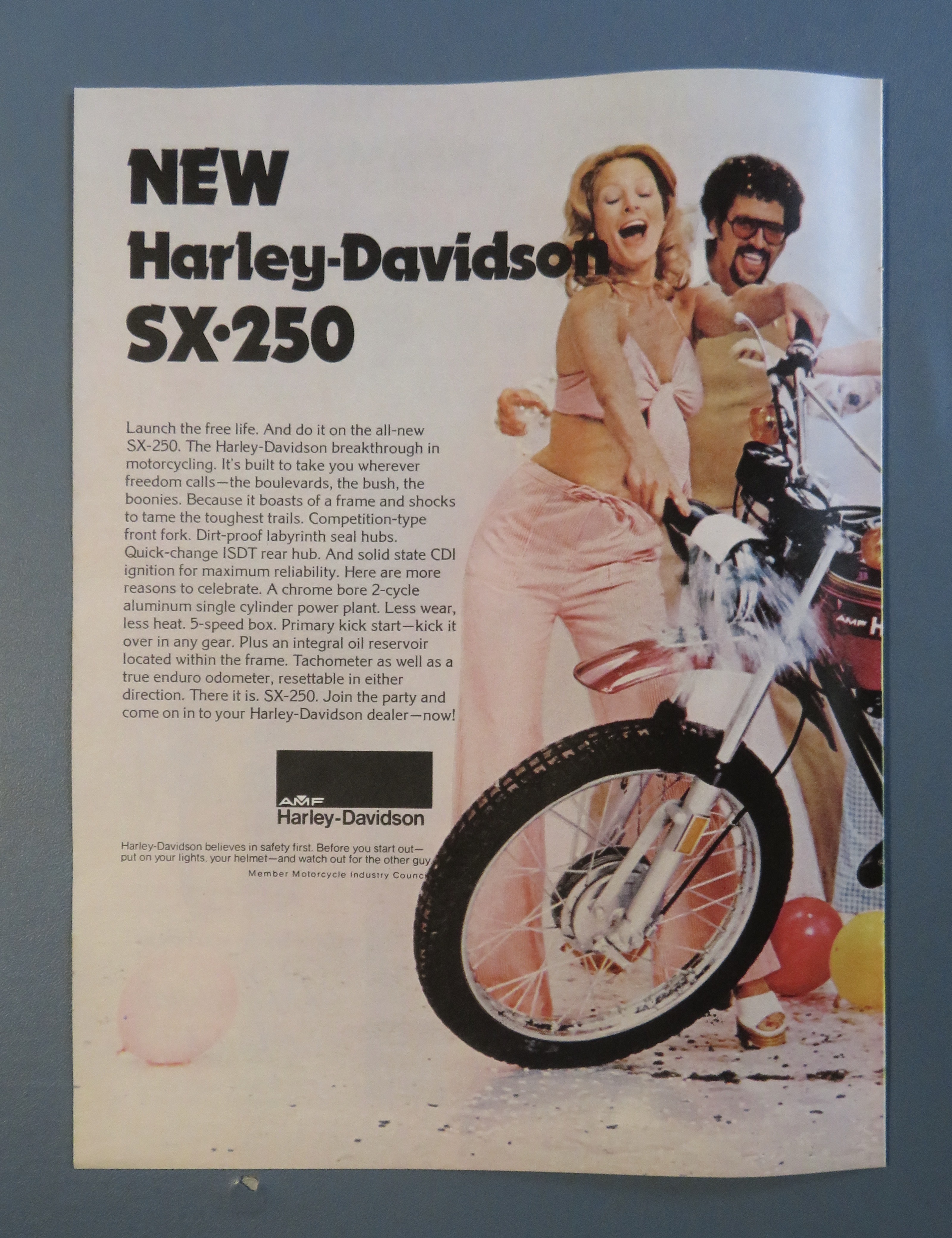 1974 Harley Davidson SX-250 Motorcycle with Man Sitting