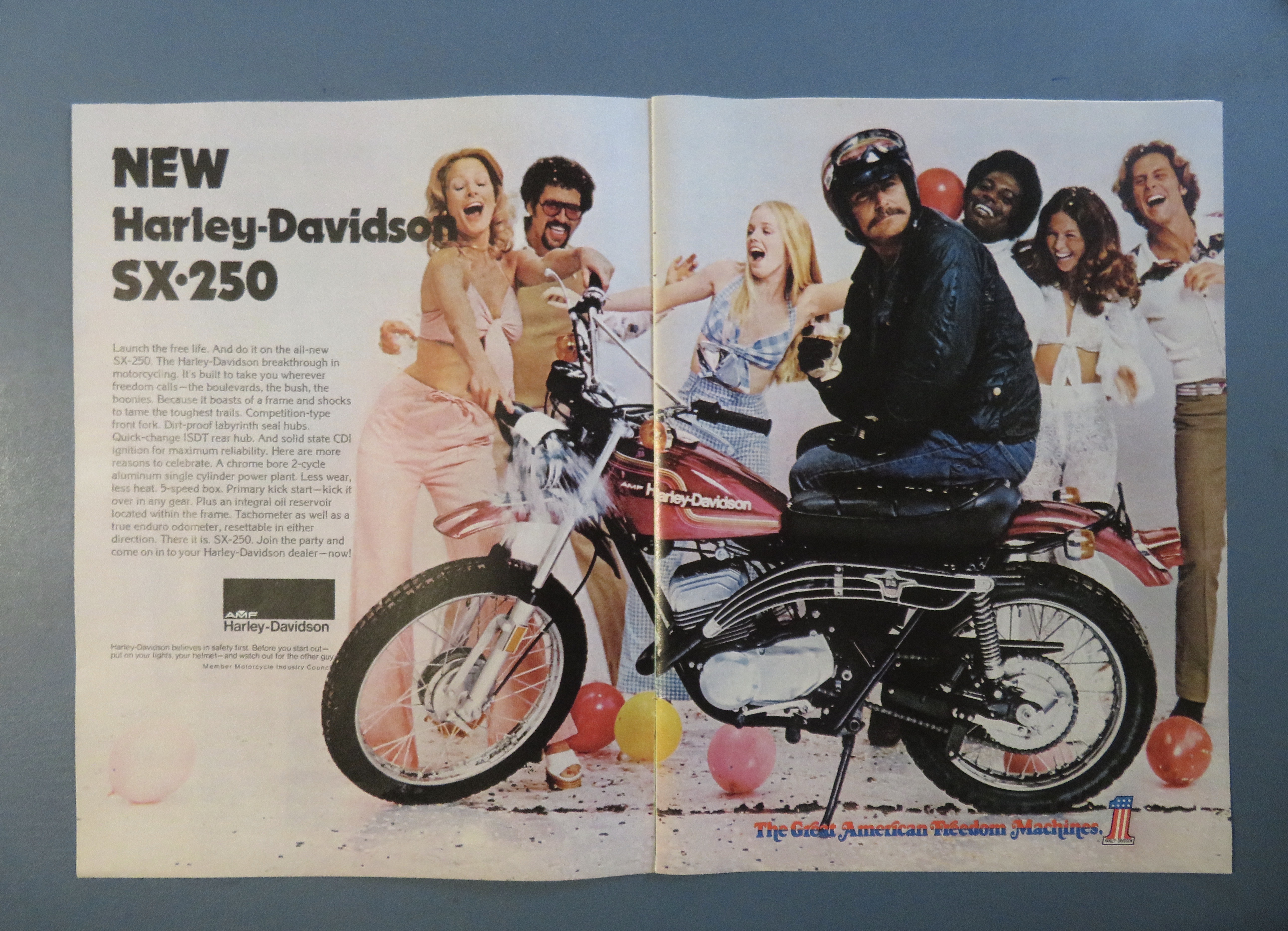 1974 Harley Davidson SX-250 Motorcycle with Man Sitting