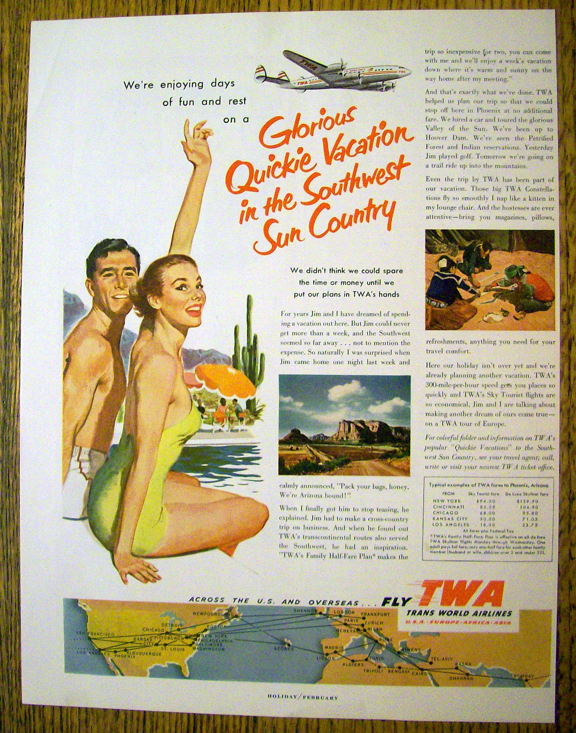 1953 Trans World Airlines (TWA) w/ Man & Woman By Pool
