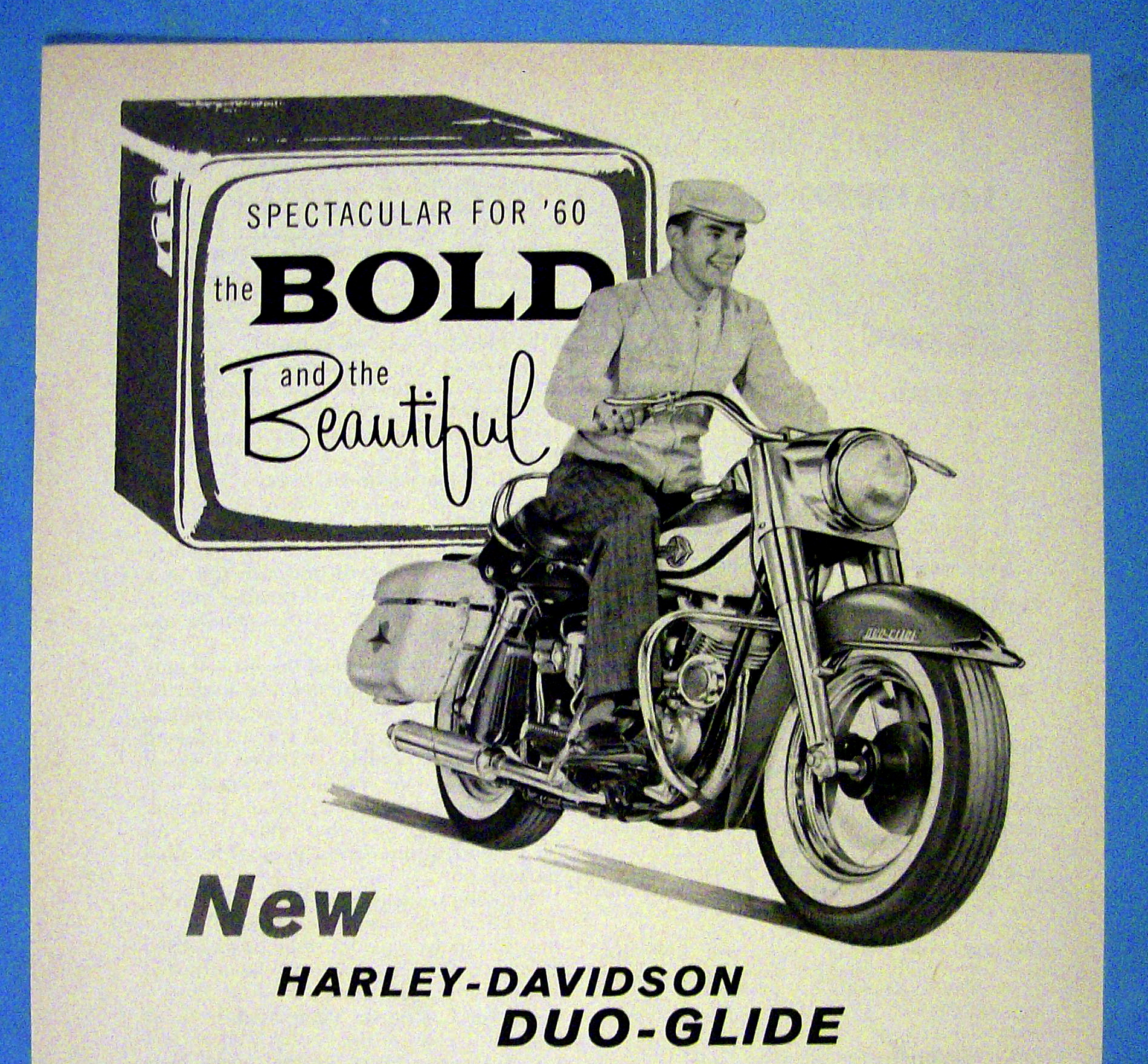 1960 Harley Davidson Duo Glide with Man on Bike