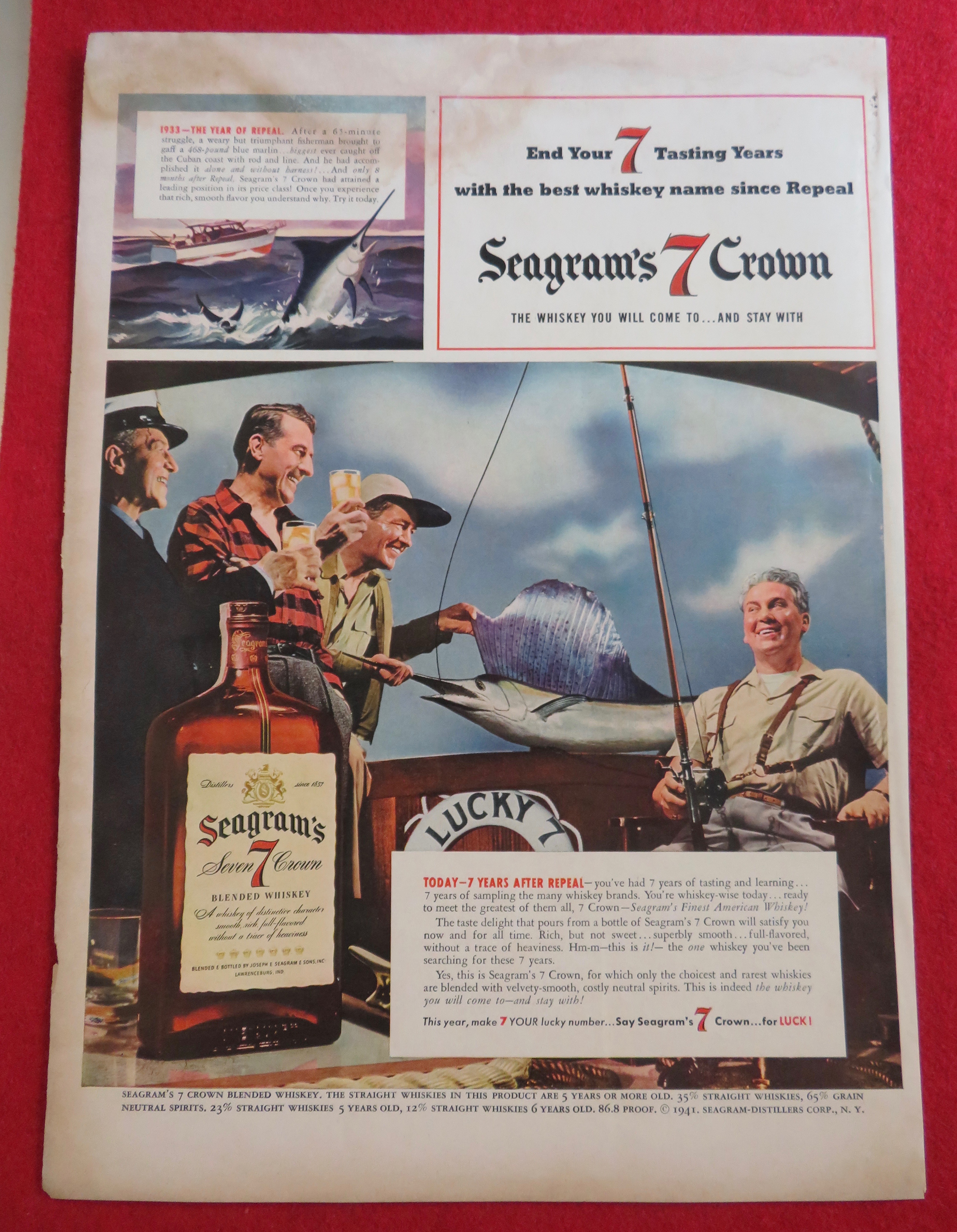 1941 Seagram's 7 Crown with Men Drinking With Big Fish