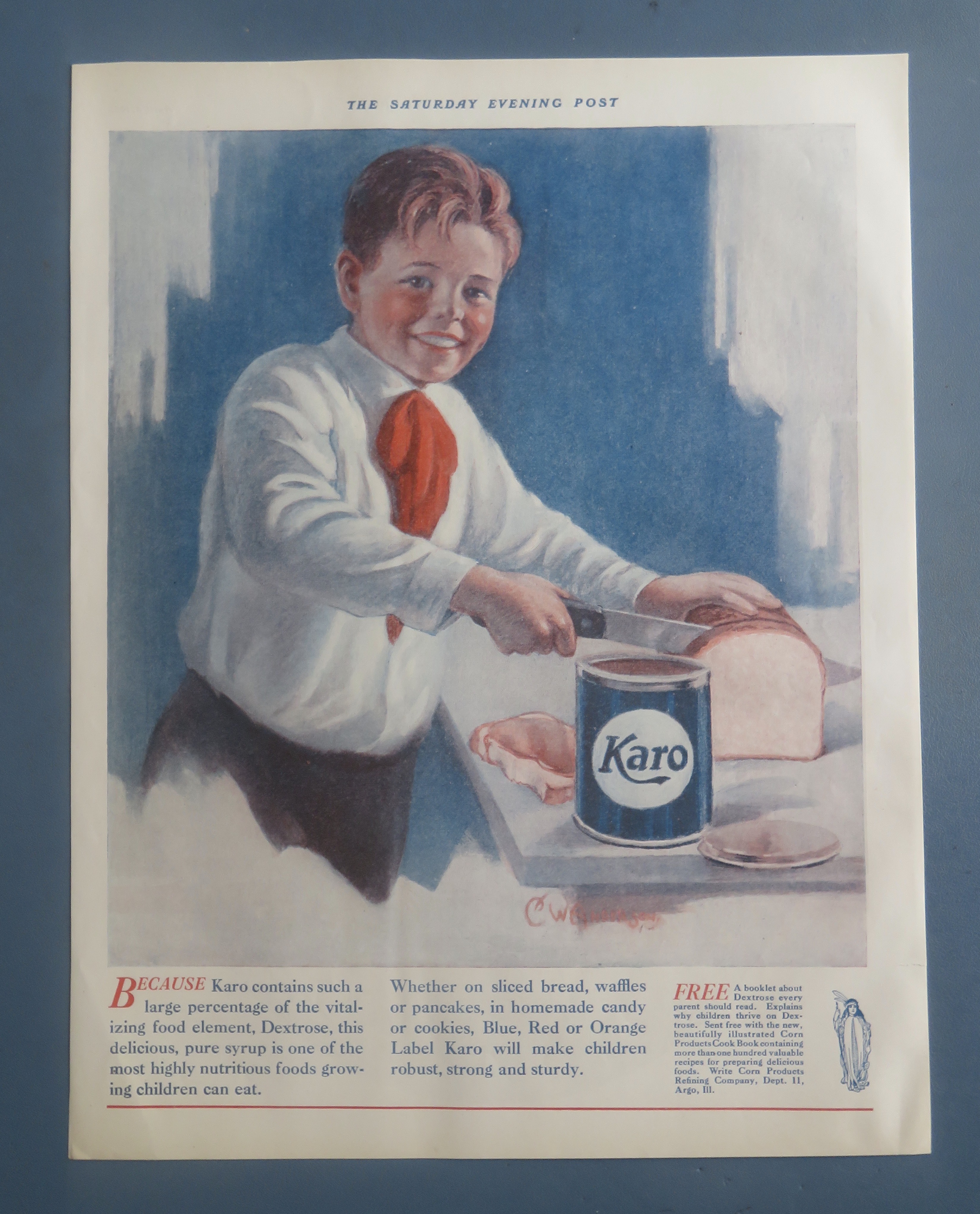 1925 Karo Syrup with Boy Cutting Bread