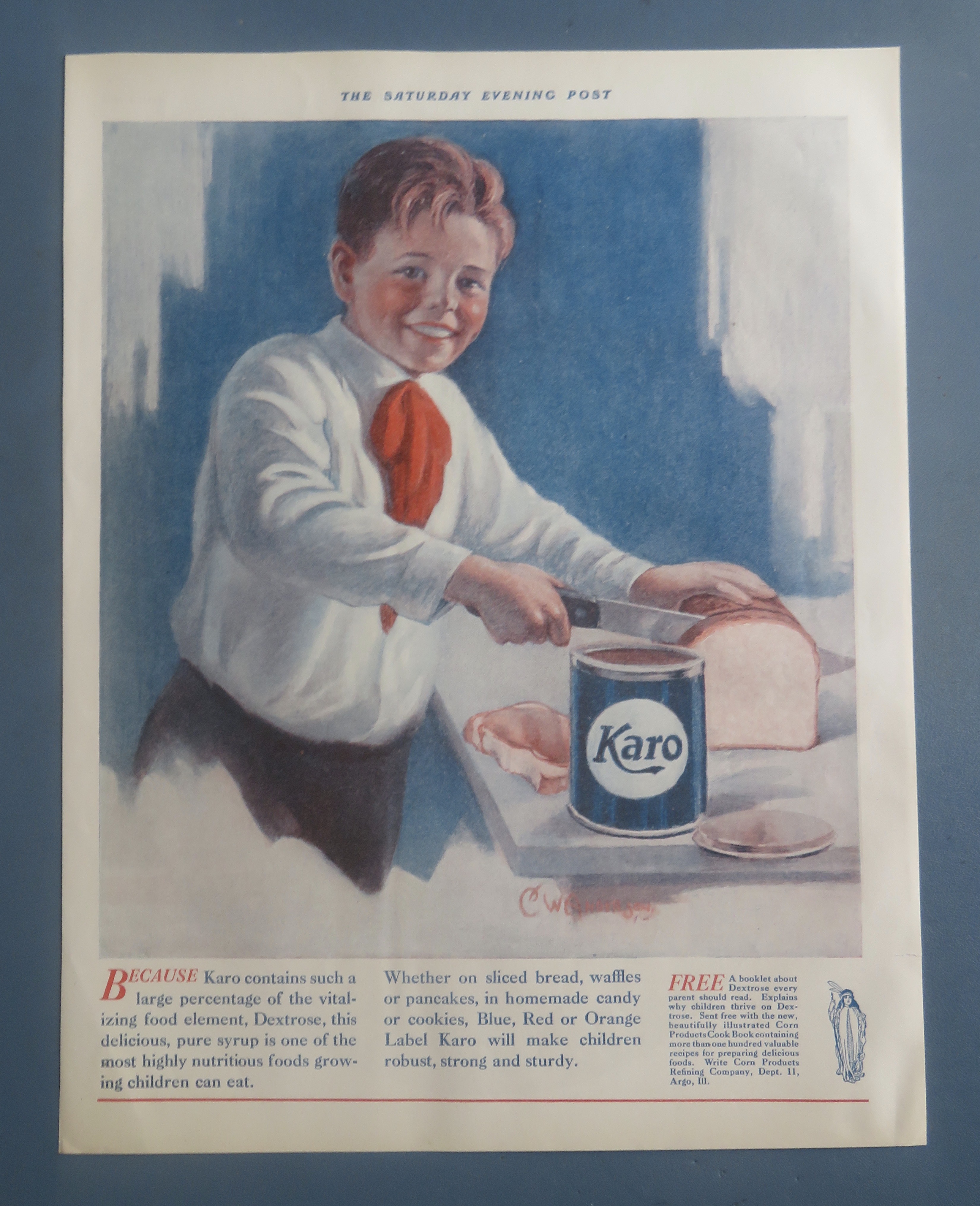 1925 Karo Syrup with Boy Cutting Bread