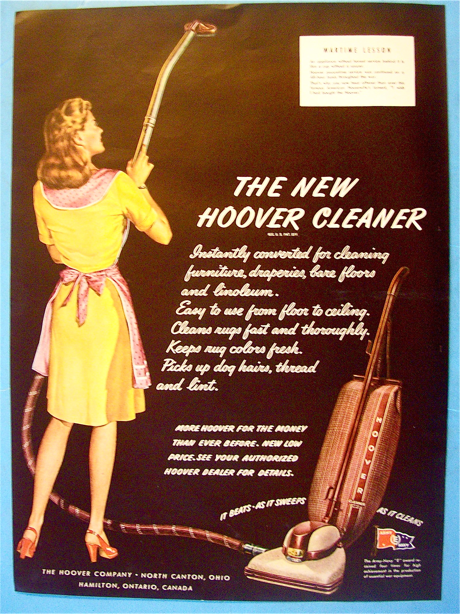 1945 New Hoover Cleaner with Woman  Vacuuming