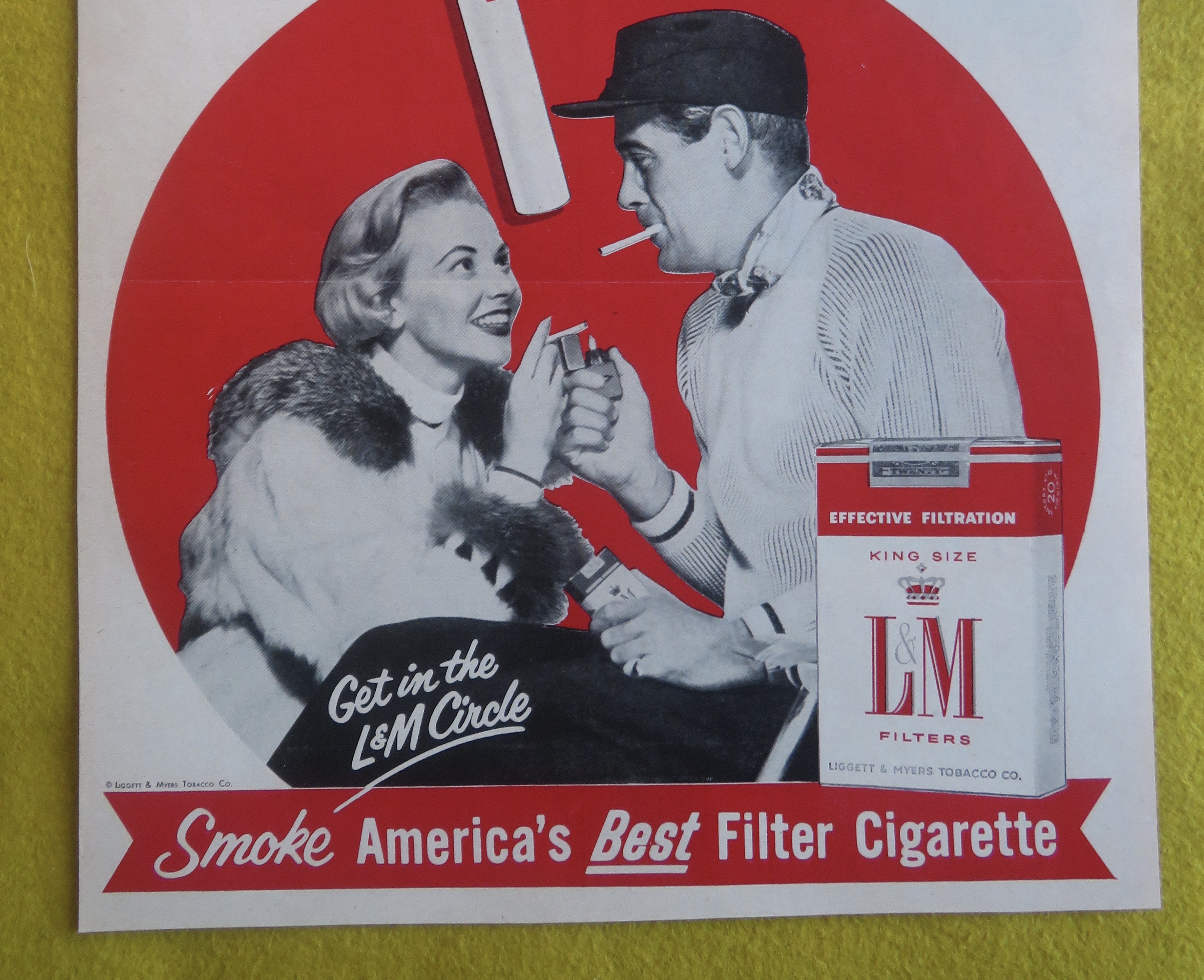 1956 L & M Cigarettes w/ Man Lighting Woman's Cigarette